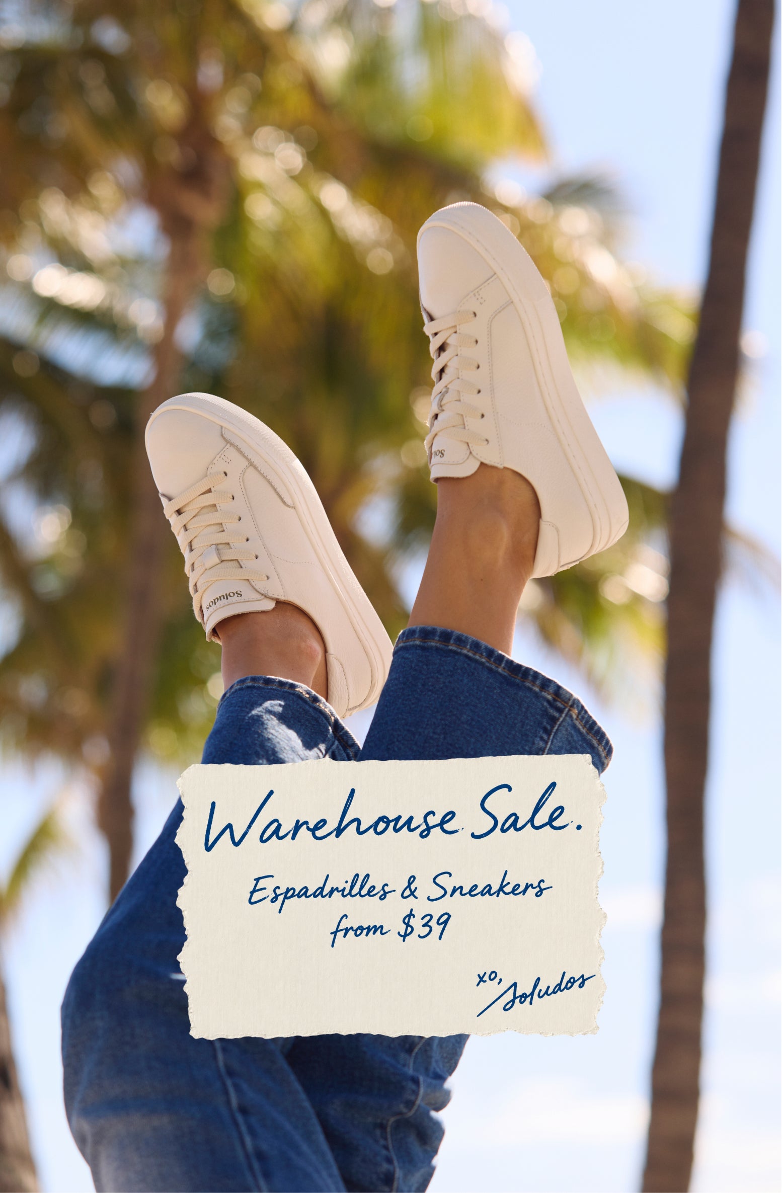 Cream platform sneakers worn with blue jeans against a sunny palm-tree background, featuring “Warehouse Sale” promotional text.