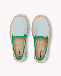 Kids mint espadrille shoes with green piping on gray background