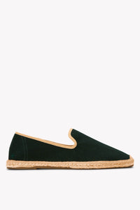 Men's oak green espadrille shoes with tan piping on gray background