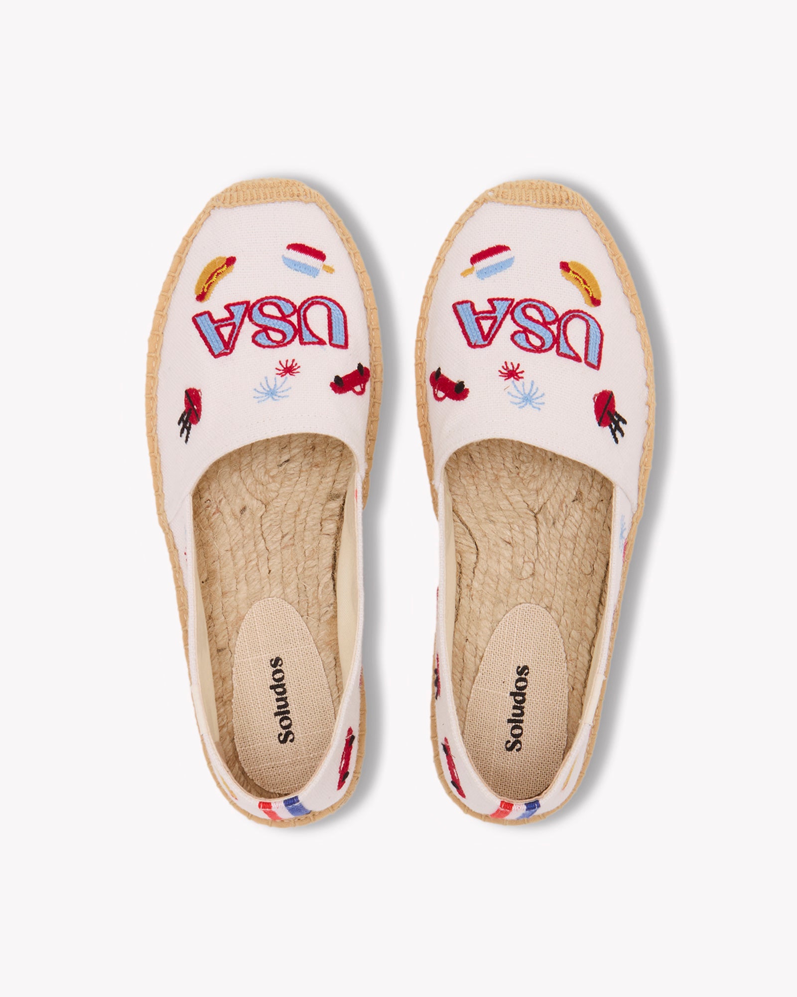 Overhead view of women's USA embroidery espadrille in white with colorful embroidery