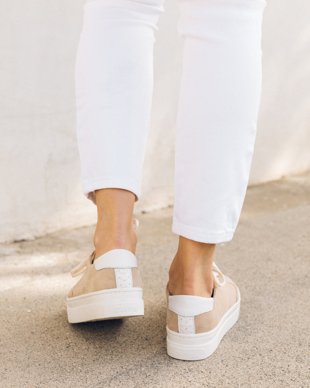 woman wearing sneakers