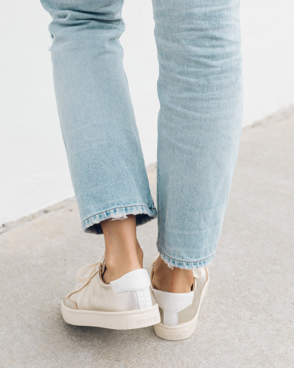 woman wearing sneakers