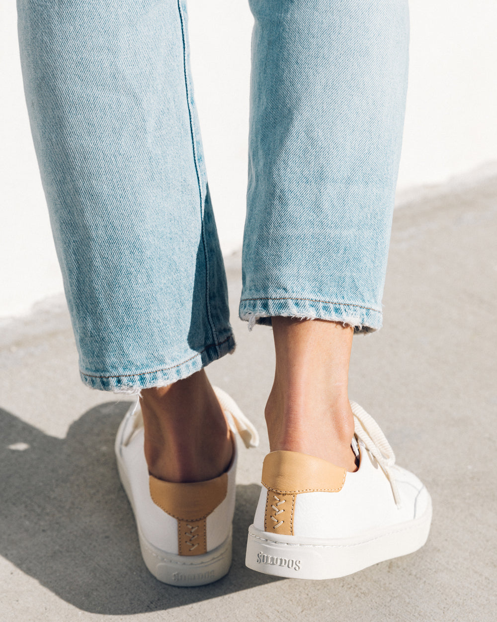 woman wearing sneakers