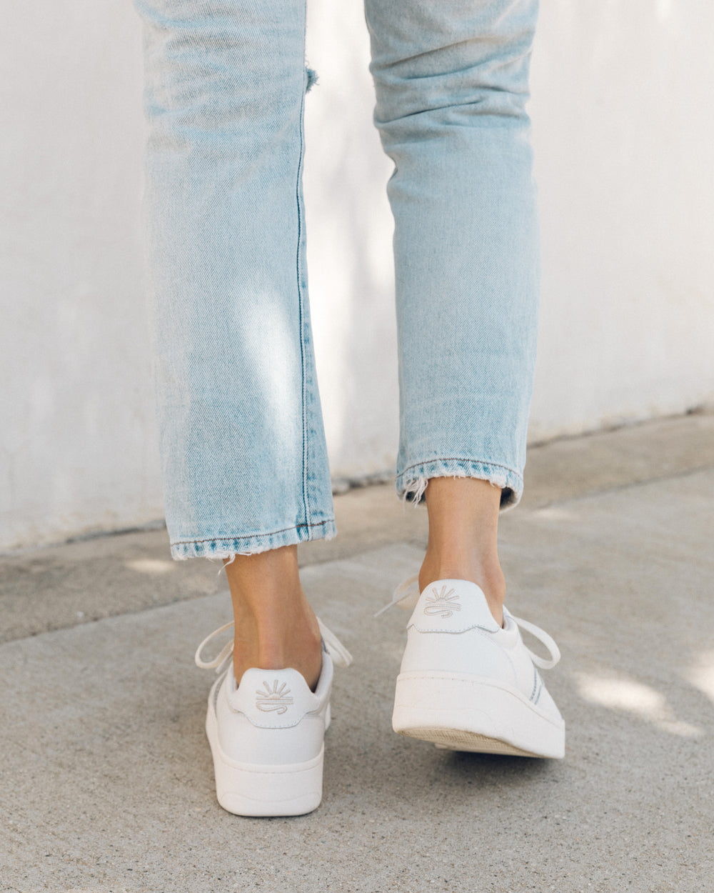 woman wearing sneakers